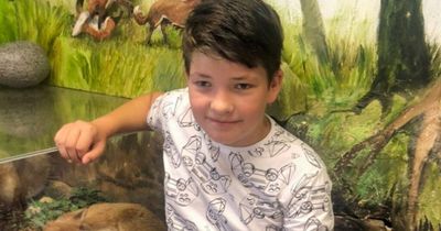 Boy, 12, crushed to death by wall 'lay dying next to dad for hours until mum found them'