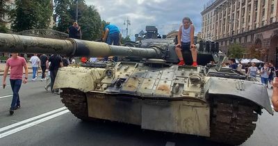 Ukrainian refugee returns to Kyiv from Ireland because she believes scarce accommodation should be for the more needy - as son, 9, trains to handle explosives