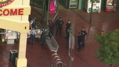 Man allegedly fires gun in shopping centre daylight robbery in Sydney's south-west