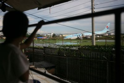 Philippine airport partially reopens despite stuck plane