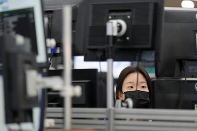 Asian shares mostly lower on worries over China outlook