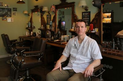 Moscow barbers describe fight for survival as mobilisation cuts staff and customers