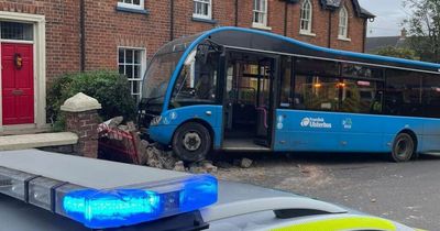 Ulsterbus crashes into front gardens and demolishes wall