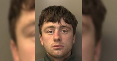 Police hunt wanted man after release from prison