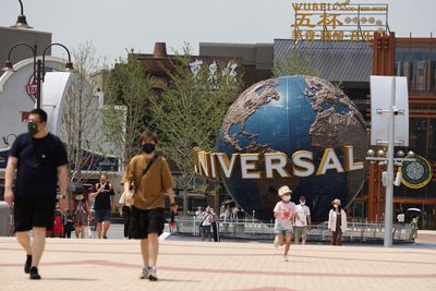 Beijing shuts Universal Resort, Wuhan locks down district in COVID curbs