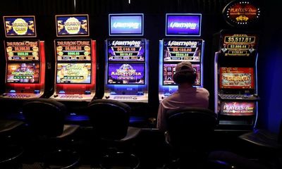 Billions in ‘dirty’ money going into NSW pokies should be addressed by cashless gaming card, crime commission says