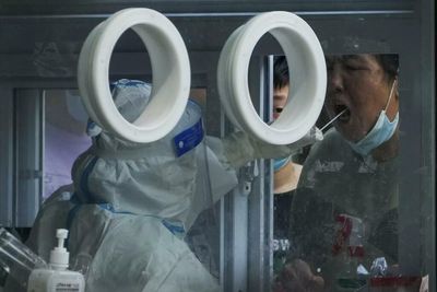 China locks down parts of Wuhan as Covid cases emerge