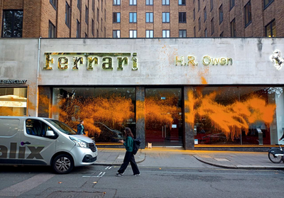 Just Stop Oil protesters spray orange paint over Ferrari Mayfair