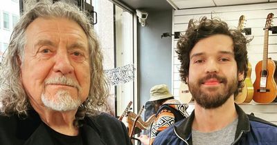 Robert Plant visits Belfast music store to buy a harmonica before Ulster Hall show