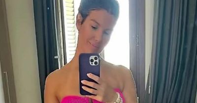 Rebekah Vardy tells fans 'no excuses' as she shows off her six pack in a pink bikini
