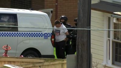 Wollongong siege suspect arrested after car chase, five-hour hostage situation