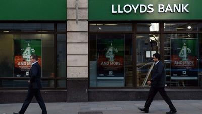Lloyds Banking Group gears up for loan losses as profits slide