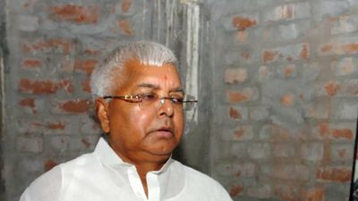 Lalu back from Singapore, but visit to Bihar may take some time