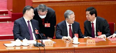 Speculation swirls over Hu's sudden exit from party congress