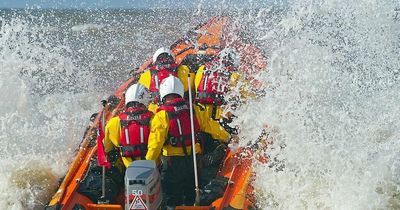 Helicopter winches person to safety as tide cuts them off from land