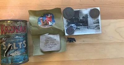 Man gobsmacked by contents of 100-year-old time capsule he found in back garden