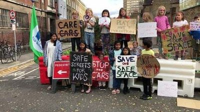 Children protest against Tower Hamlets mayor Lutfur Rahman's decision to axe school street