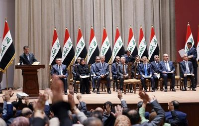 Iraq parliament approves new government after year of deadlock