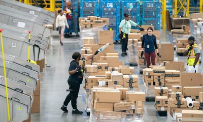 Amazon shares drop nearly 20% after company predicts weaker holiday sales