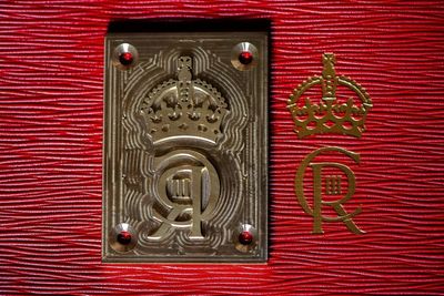 Brass die will emboss King’s cypher on to famous red boxes