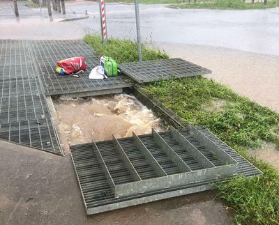 ‘I love you all!’: boy sucked into stormwater drain in Melbourne praises rescuers after amazing escape