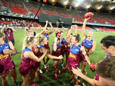 Lions romp by Pies to take top AFLW spot