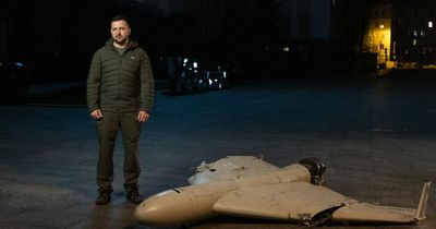 Zelensky stands next to downed drone as he says Russia has deployed dozens in two days