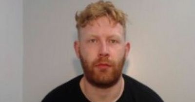 Jailed robber racially abused prison officer in 'barbaric' tirade and threatened to kill him