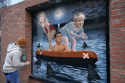 Sharks circle PM in new Belfast mural