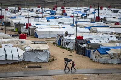 Australia repatriates 17 women and children from Syrian camp