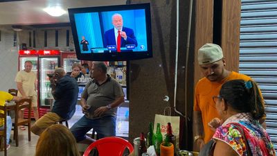 Bolsonaro, Lula supporters watch Brazil’s final presidential debate with football fervour