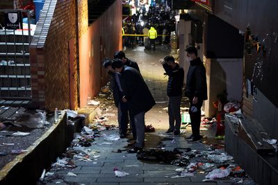 Halloween stampede in Seoul leaves at least 149 dead