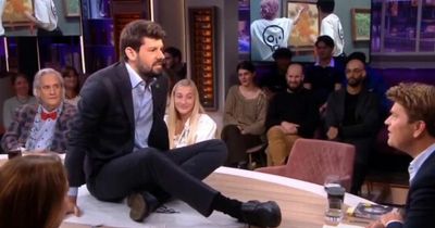 Extinction Rebellion activist glues himself to desk in live appearance on major talk show