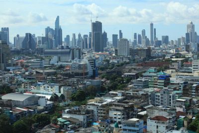 Govt stands by land sales to foreigners