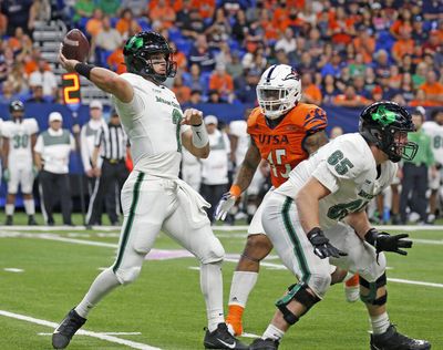 North Texas QB Austin Aune is 29 and has thrown for more than 2,000 yards