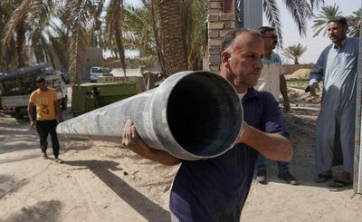 For water-stressed Iraq, wells threaten race to the bottom