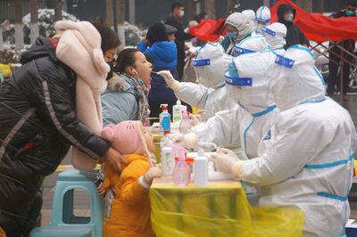 Chinese cities brace for wave of Foxconn workers from COVID-hit Zhengzhou