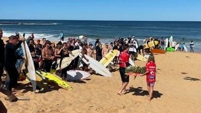 Surfing community paddles out to farewell former pro-surfer Chris 'Davo' Davidson