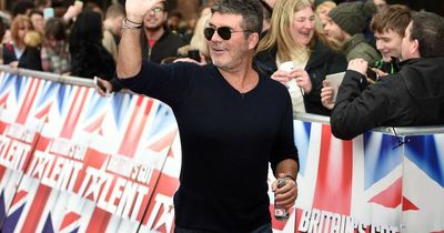 Simon Cowell says he was 'really unhappy' before becoming dad