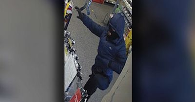 Detectives release CCTV image of balaclava-clad man they want to speak to after knife robber steals £3k in Spar raid