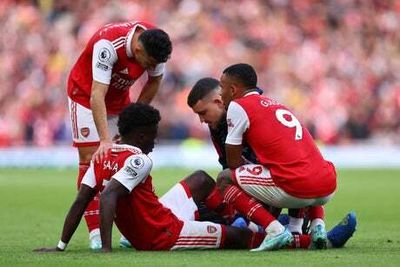 Bukayo Saka injury: Arsenal and England dealt blow as forward forced off vs Nottingham Forest