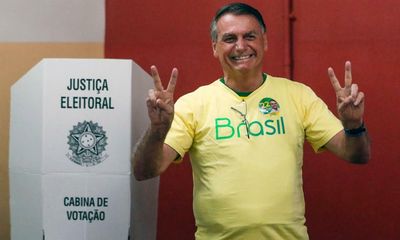 ‘He must be stopped’: emotions run high as Brazil’s voters go to polls