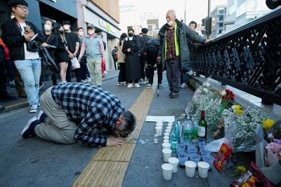 South Korean families desperate for answers after loved ones crushed in Seoul tragedy
