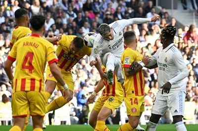 Leaders Madrid drop points at home in Girona draw
