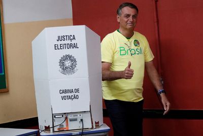Bolsonaro takes lead in initial vote count of Brazil election