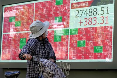 Asian markets higher ahead of Fed rates decision