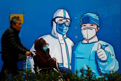 China COVID curbs hit iPhone output, shut Shanghai Disney