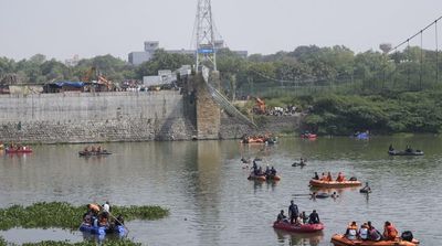 India Bridge Collapse Toll Jumps to 134, Police Detain Nine