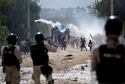 Haiti to investigate death of journalist struck by tear gas cannister