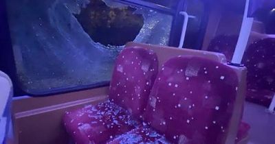 Edinburgh woman showered in glass as youths throw large rock through bus window